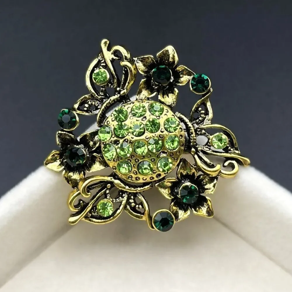 Yellow Gold with Emerald and Peridot Green Crystal Flower Pin Back Brooch